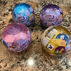 Disney Crystal Surprise Series 1 Dolls - Blue, Purple, Pink, and Gold